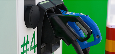 A green fuel pump with two nozzle's